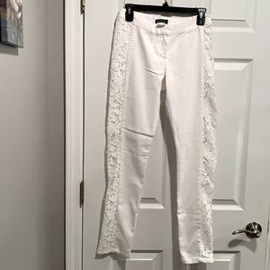 Venus white pants with lace inserts.